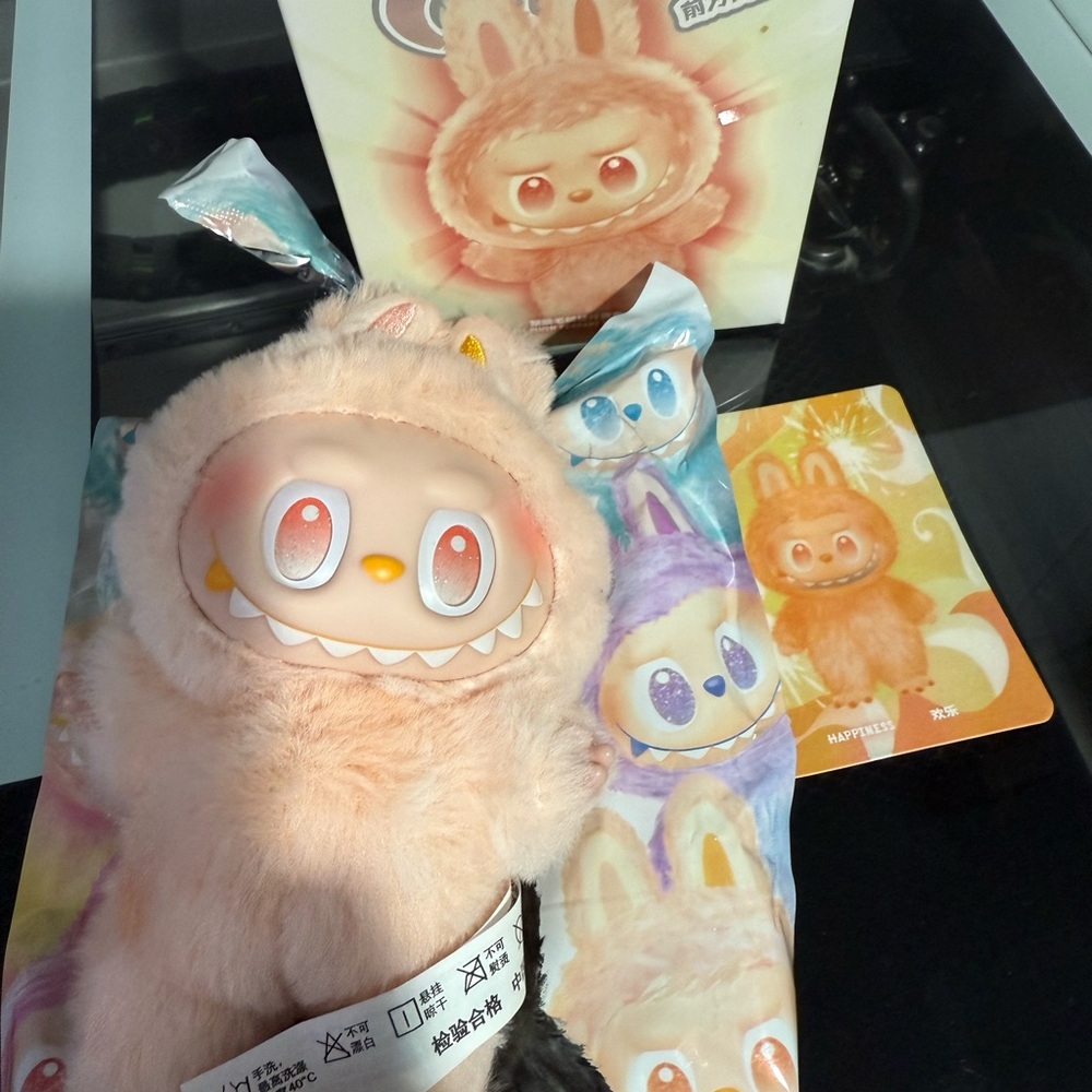 Fluffy Monster Plush Toy with Cream and Orange Accents